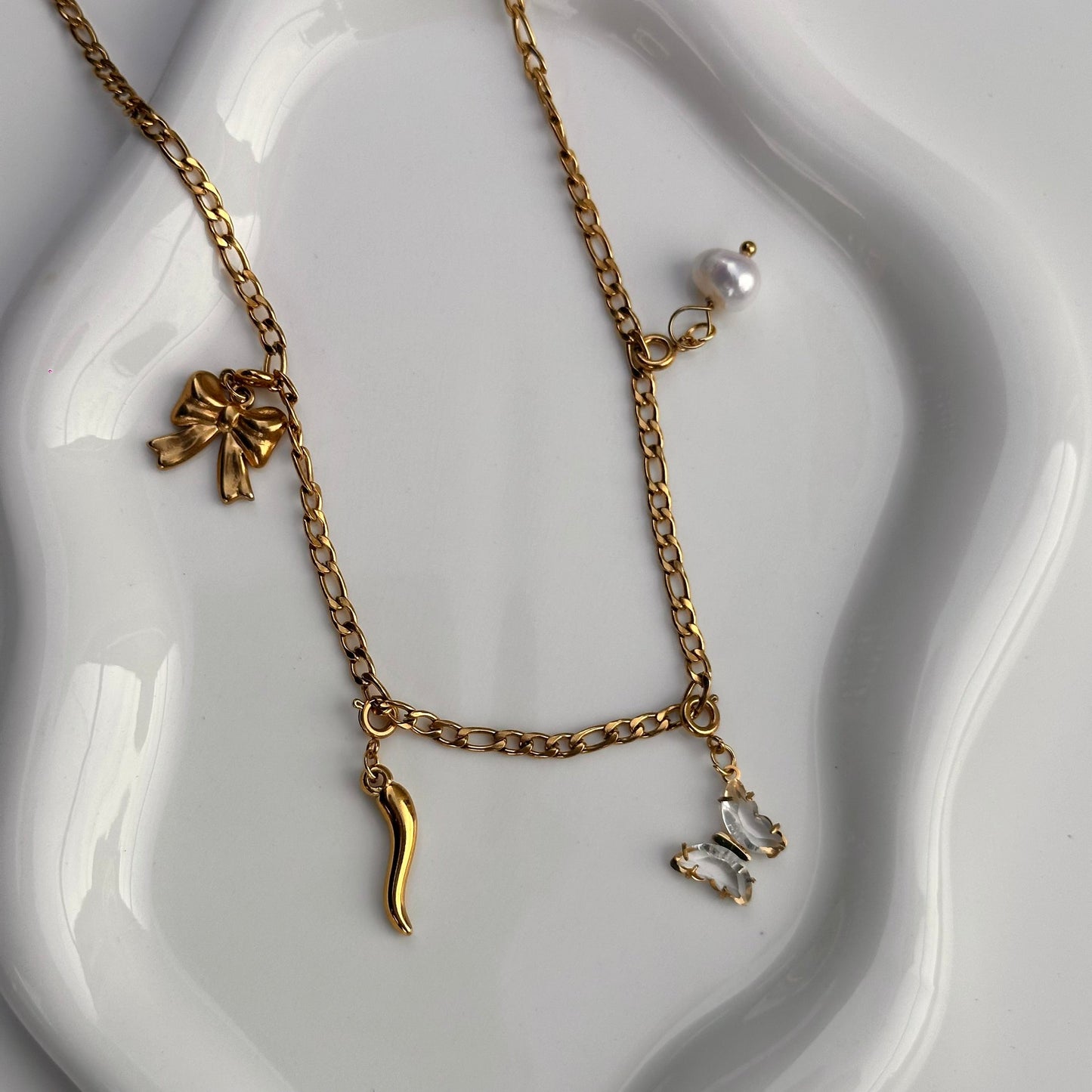 Breloque papillon en zircon